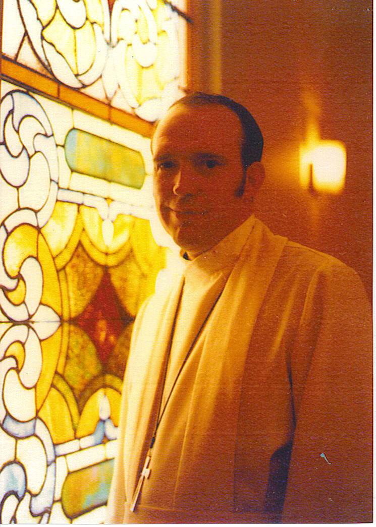 Van by stainglass window in Cambridge